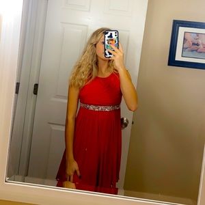 red dress with a jewel belt